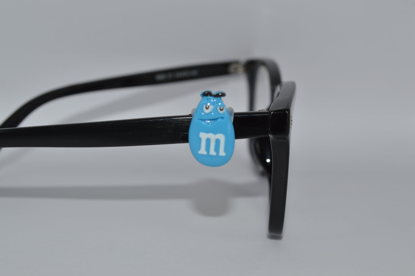 M&M Eyedeco Charm                                                   K30