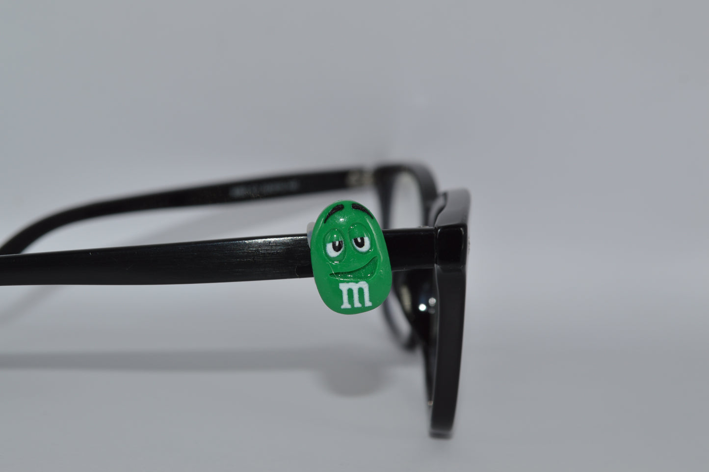 M&M Eyedeco Charm                                                   K30