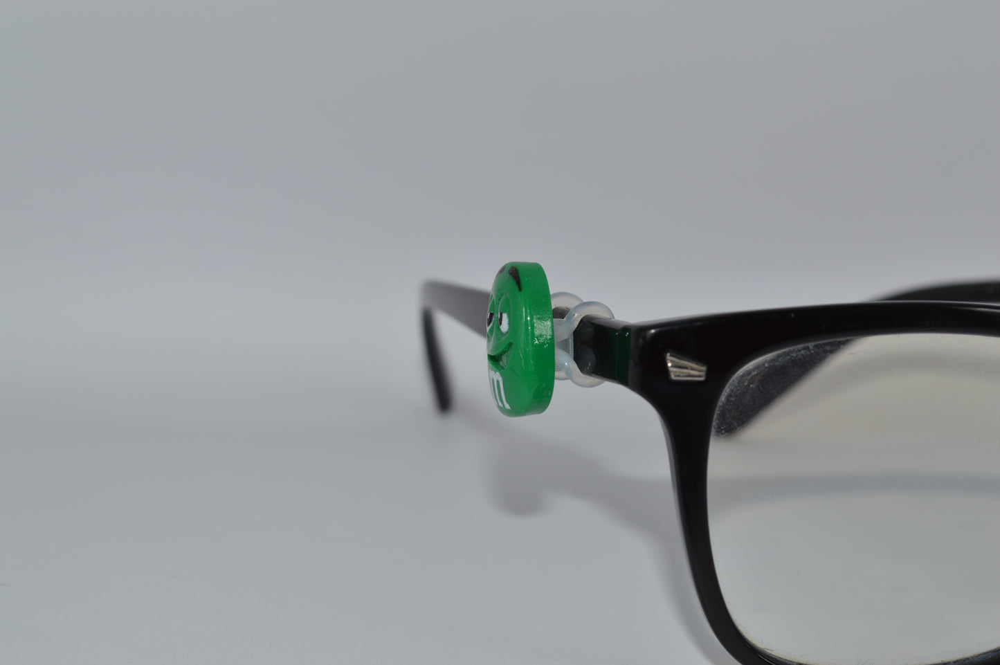 M&M Eyedeco Charm                                                   K30
