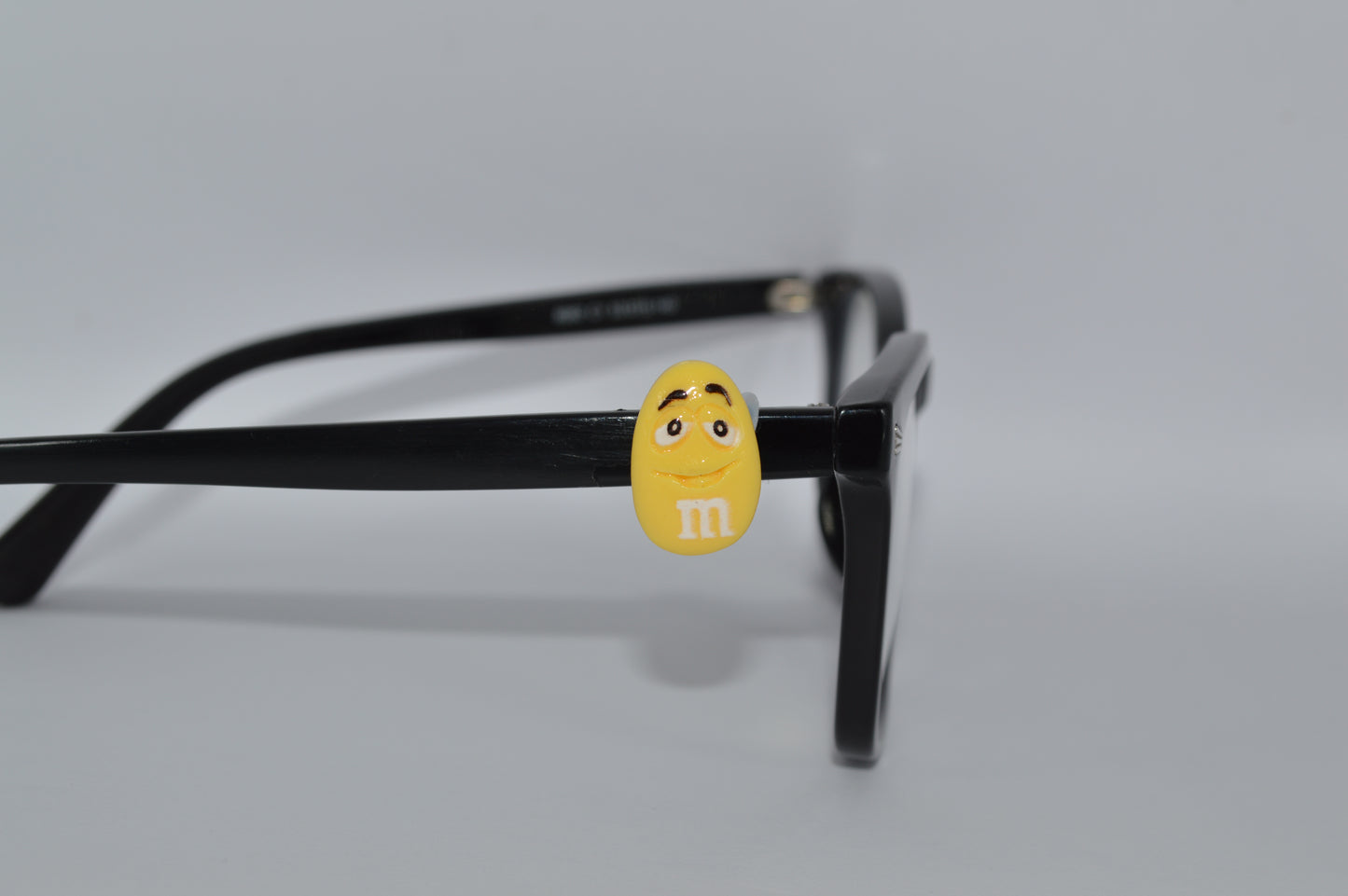 M&M Eyedeco Charm                                                   K30