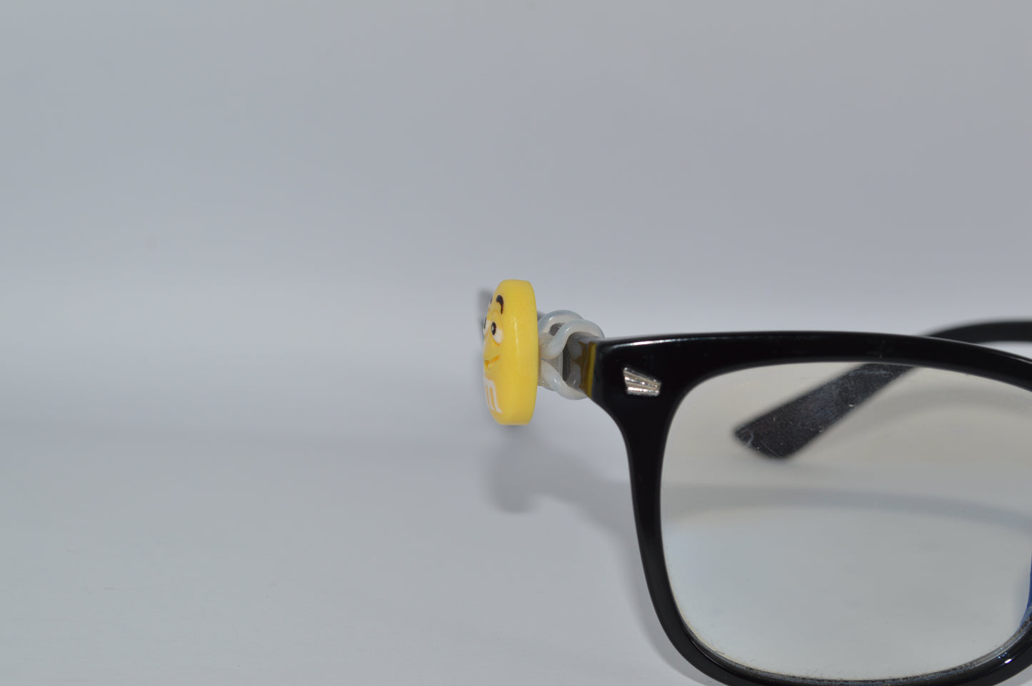 M&M Eyedeco Charm                                                   K30